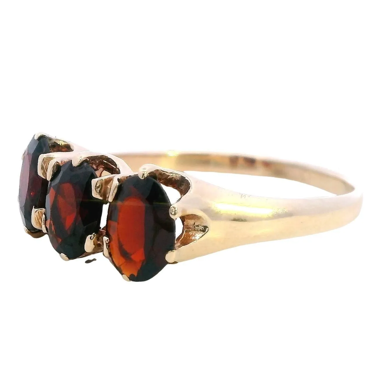 A Treasure of Timeless Elegance 9ct Yellow Gold 3 stone Garnet Ring